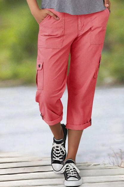 Spodnie Capri z kieszeniami i średnim stanem, zakładkami u dołu i kilkoma kieszeniami