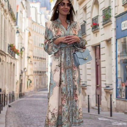 Elegancka sukienka z dekoltem w serek, wysokim stanem, kwiatowym nadrukiem i guzikami