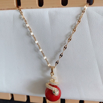 🐍Specjalna oferta noworoczna🎀 Kolczyki z pozłacanej perły w kształcie węża