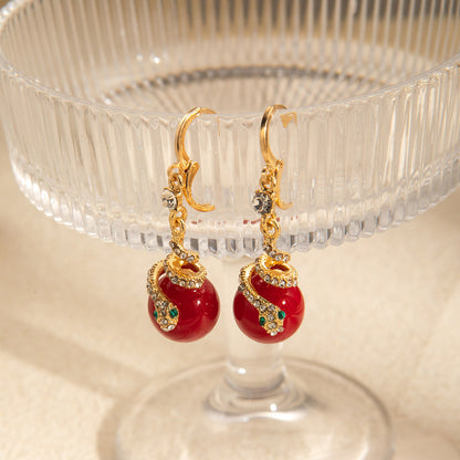 🐍Specjalna oferta noworoczna🎀 Kolczyki z pozłacanej perły w kształcie węża