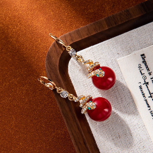 🐍Specjalna oferta noworoczna🎀 Kolczyki z pozłacanej perły w kształcie węża