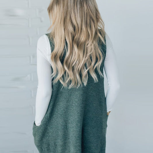 Damska luźna kamizelka sweterkowa z golfem i kieszeniami