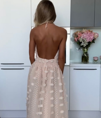 Letnia damska modna sukienka z odkrytymi plecami i dużym rozcięciem