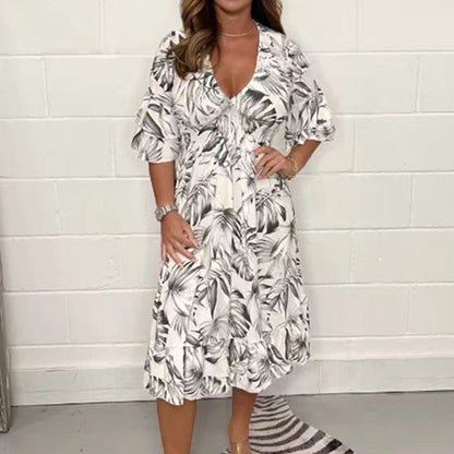 👗✨ Eleganckie sukienki damskie z dekoltem w serek i wzorem botanicznym