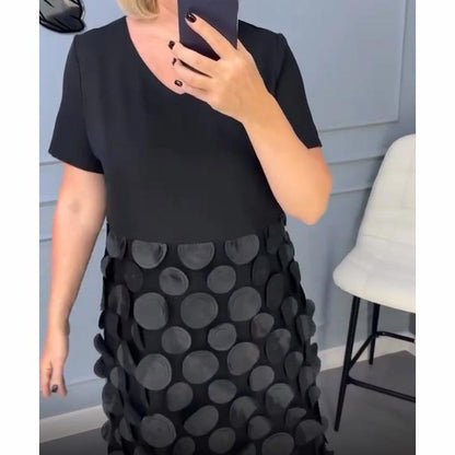 Elegancka damska sukienka z dekoltem w serek w kolorze czarnym z nieregularnym żakietem, dwuczęściowy komplet