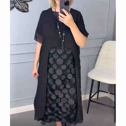 Elegancka damska sukienka z dekoltem w serek w kolorze czarnym z nieregularnym żakietem, dwuczęściowy komplet