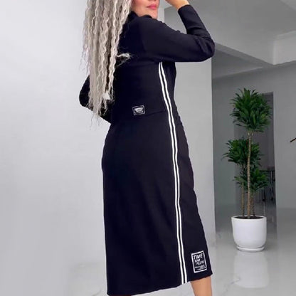 Damska sukienka z długim rękawem, zapinana na guziki i wycięciami