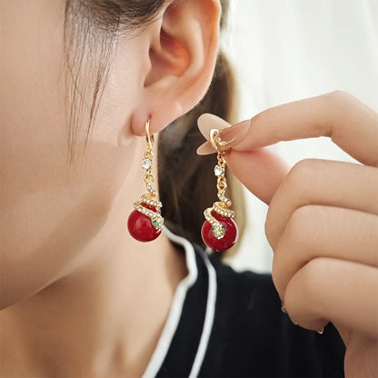 🐍Specjalna oferta noworoczna🎀 Kolczyki z pozłacanej perły w kształcie węża