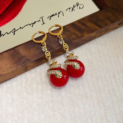 🐍Specjalna oferta noworoczna🎀 Kolczyki z pozłacanej perły w kształcie węża