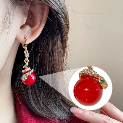 🐍Specjalna oferta noworoczna🎀 Kolczyki z pozłacanej perły w kształcie węża