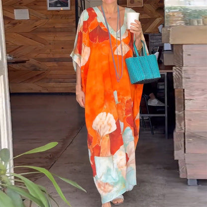 Sukienka z długim, luźnym rękawem i nadrukiem kwiatowym