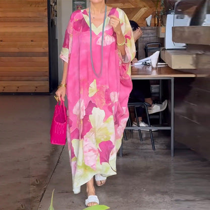 Sukienka z długim, luźnym rękawem i nadrukiem kwiatowym