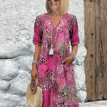 💥Damska sukienka midi z dekoltem w serek i nadrukiem