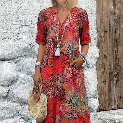 💥Damska sukienka midi z dekoltem w serek i nadrukiem