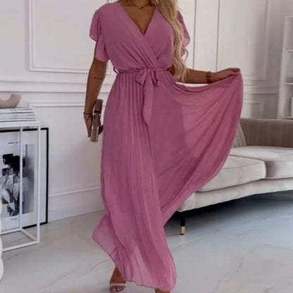 Jednolita plisowana sukienka damska z dekoltem w szpic