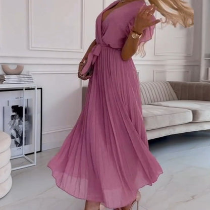 Jednolita plisowana sukienka damska z dekoltem w szpic