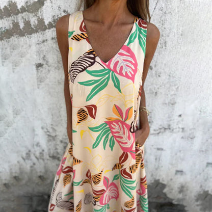 Modna sukienka z dekoltem w serek, luźną kieszenią i nadrukiem bez ramiączek