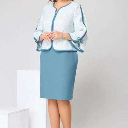 Elegancki top z kokardą i spódnica z rozcięciem na plecach