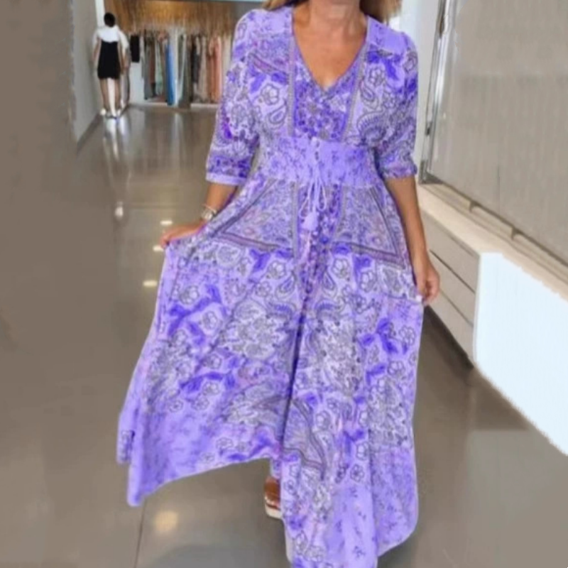 Elegancka damska sukienka z kwiatowym wzorem i długim ściągaczem