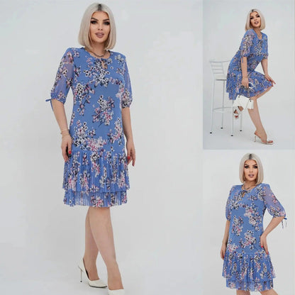 Elegancka damska sukienka plisowana z krótkim rękawem i długą spódnicą