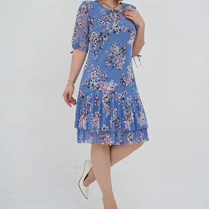 Elegancka damska sukienka plisowana z krótkim rękawem i długą spódnicą