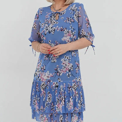 Elegancka damska sukienka plisowana z krótkim rękawem i długą spódnicą