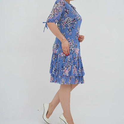 Elegancka damska sukienka plisowana z krótkim rękawem i długą spódnicą