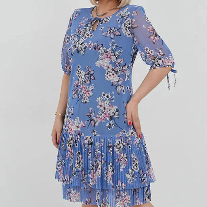 Elegancka damska sukienka plisowana z krótkim rękawem i długą spódnicą