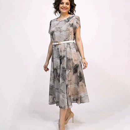 Elegancka damska sukienka midi z okrągłym dekoltem i krótkim rękawem