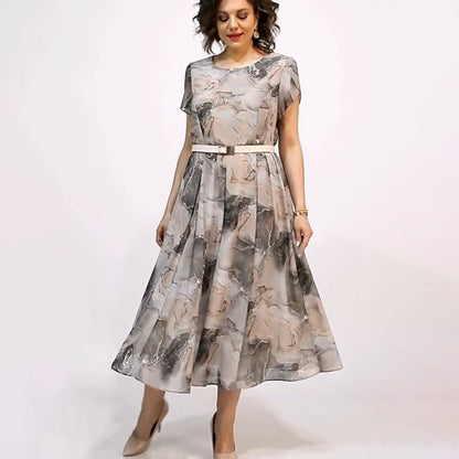 Elegancka damska sukienka midi z okrągłym dekoltem i krótkim rękawem