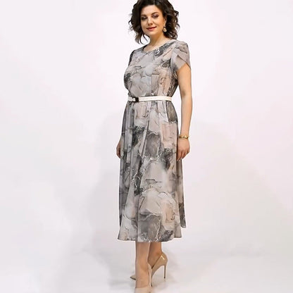 Elegancka damska sukienka midi z okrągłym dekoltem i krótkim rękawem