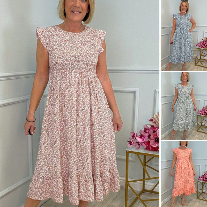 Elegancka damska sukienka w kwiaty z wysokim stanem i falbaną na rękawie