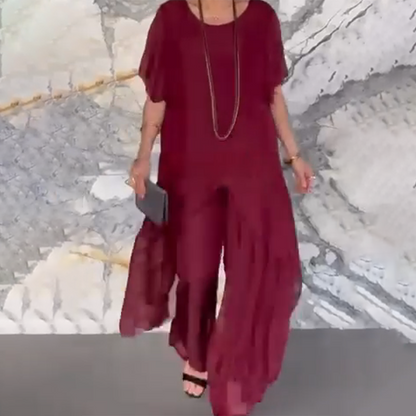 🛍️✨ Damski komplet składający się z nieregularnej bluzki i lekkich spodni