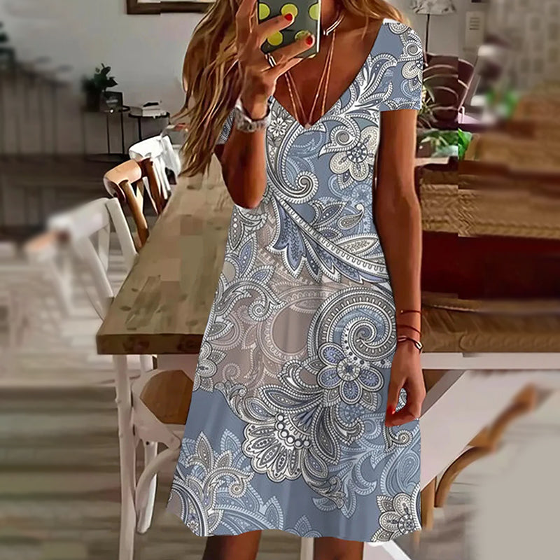 Eleganckie damskie sukienki z dekoltem w serek z nadrukiem