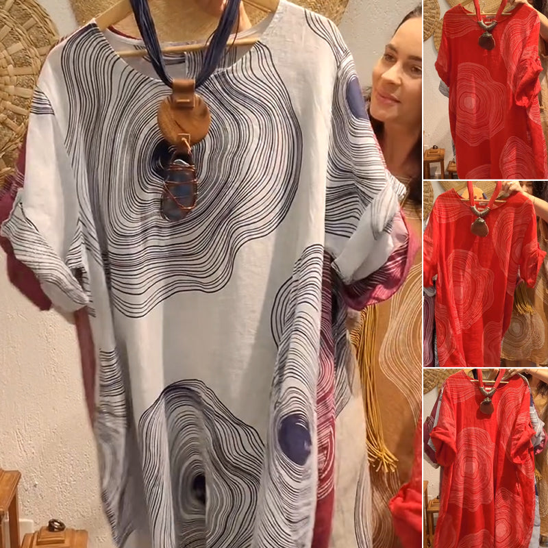 Damska sukienka z nadrukiem z dekoltem w szpic