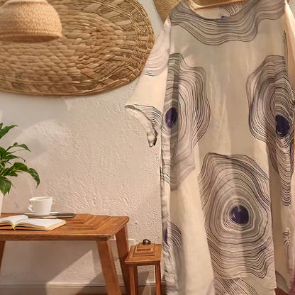 Damska sukienka z nadrukiem z dekoltem w szpic