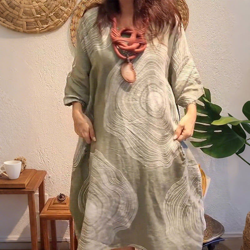 Damska sukienka z nadrukiem z dekoltem w szpic