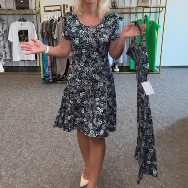 Damska sukienka casualowa z kwiatowym nadrukiem na szyi