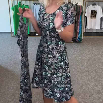 Damska sukienka casualowa z kwiatowym nadrukiem na szyi